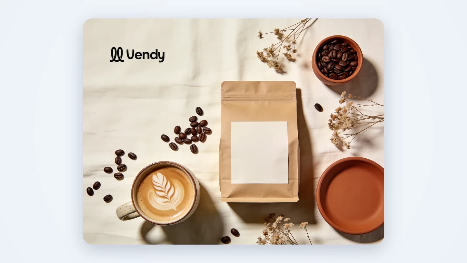 A coffee bag, beans and a latte laid out on linen: one product ready to become a set of Facebook and Instagram creatives